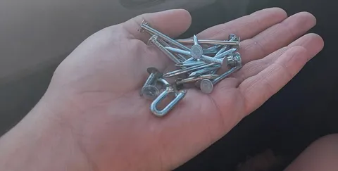 Third time we've found nails scattered along a brand-new shortcut road; we've been waiting for the road to be finished for several years.