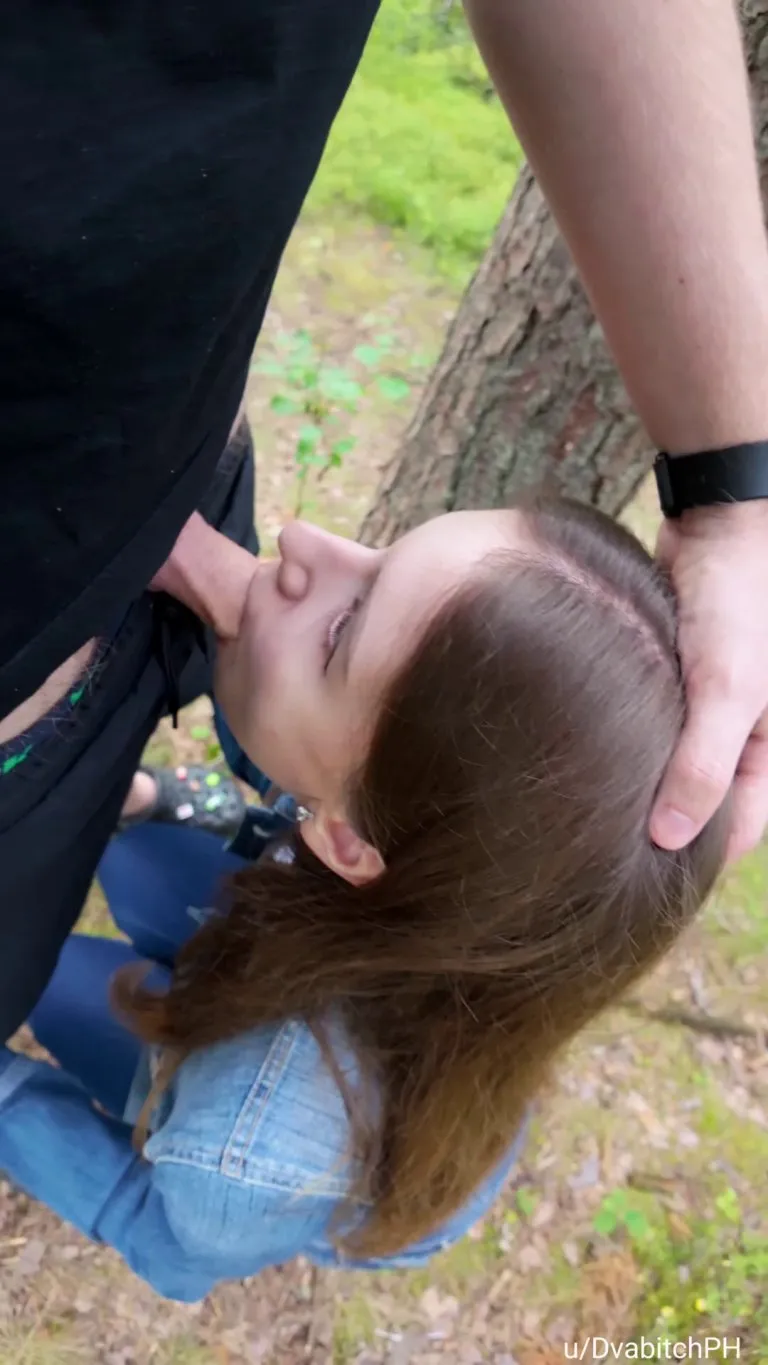 Sloppy throating and pushing my head deeper onto his cock behind the trees in the woods