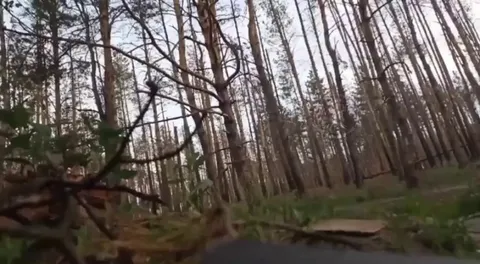 Soliders in Russia-Ukraine Battlefield manually cutting the fibre optic cables of FPV drones with a scissor