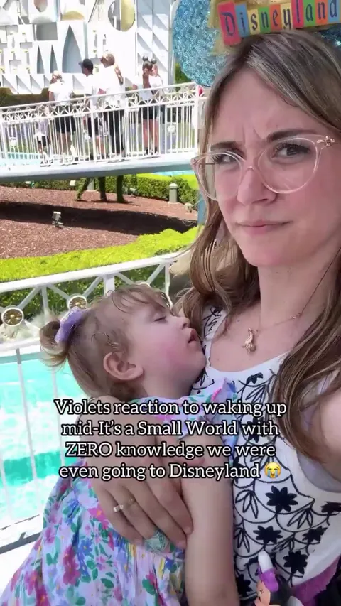Girl wakes up in the middle of a trip to Disneyland