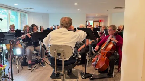 My grandpa, a WWII veteran, just turned 100. This is him conducting over 40 musicians and singers in celebration.