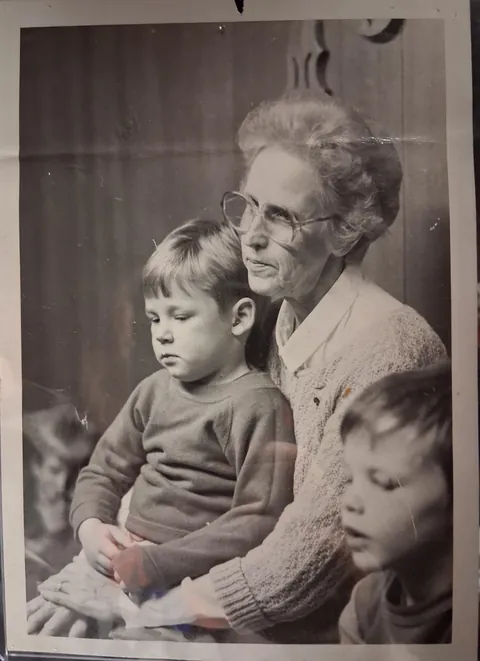 My husband and his kindergarten teacher- 1987