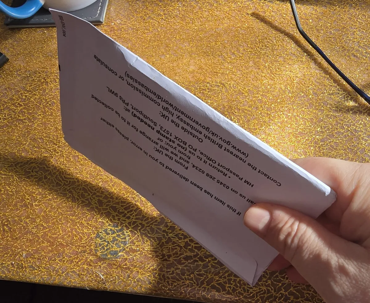 Title: HM Passport Office sent my passport in an unsecured envelope, Royal Mail left it outside