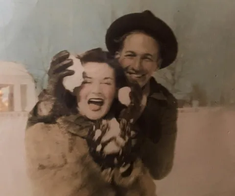My grandparents’ engagement photo, circa 1940. A rare snowfall in Beaumont, Texas!