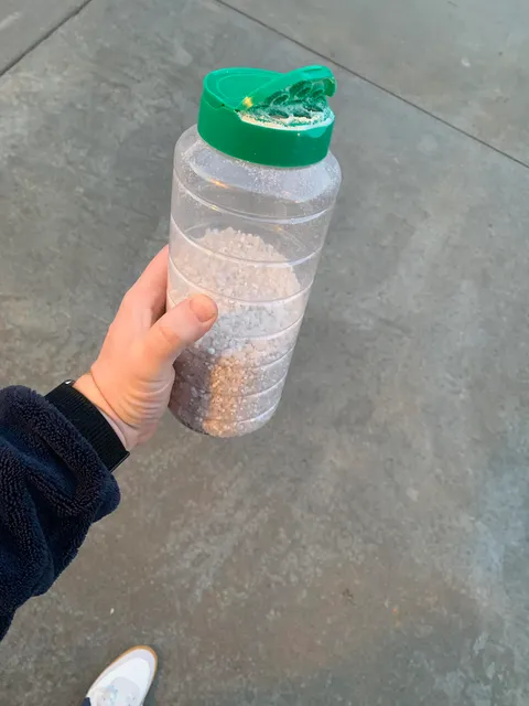 A left over parmesan cheese can makes a handy spreader for de-icer salt.