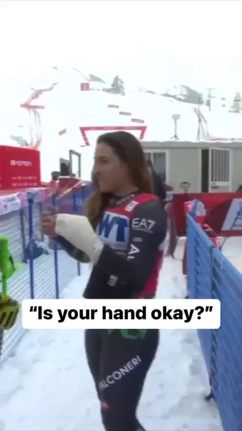 Skier breaks her hand on a gate