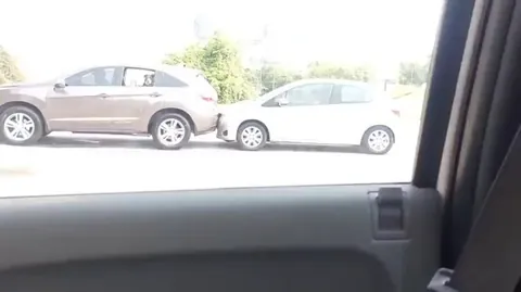 Driver crushes other persons car.
