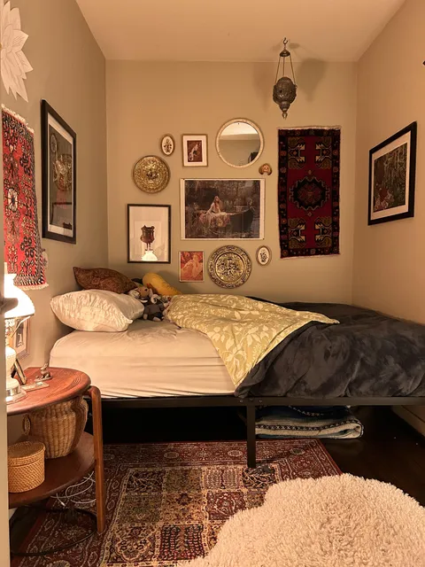 My tiny bedroom. I love spending stormy October nights here.