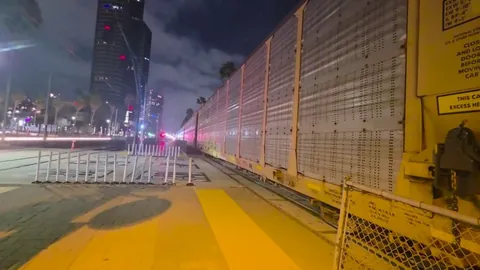 Walking back to my hotel, and I really gotta pee. The damn train stopped, and I can't get over.