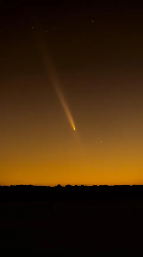 Comet over sunset.
