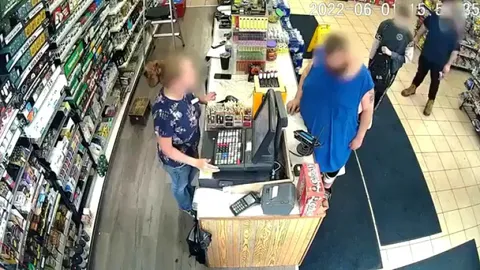 Footage of a 12 year old kid in Michigan robbing a gas station at gun point.