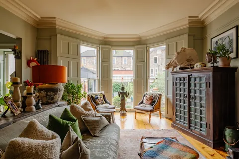 Living room with a large bay window in an 1870s Victorian villa, Bristol, England [1600x1067]