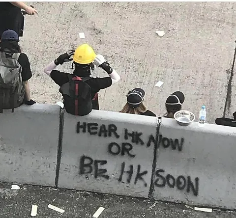 Spotted in Hong Kong: «Hear HK now, or be Hong Kong soon»