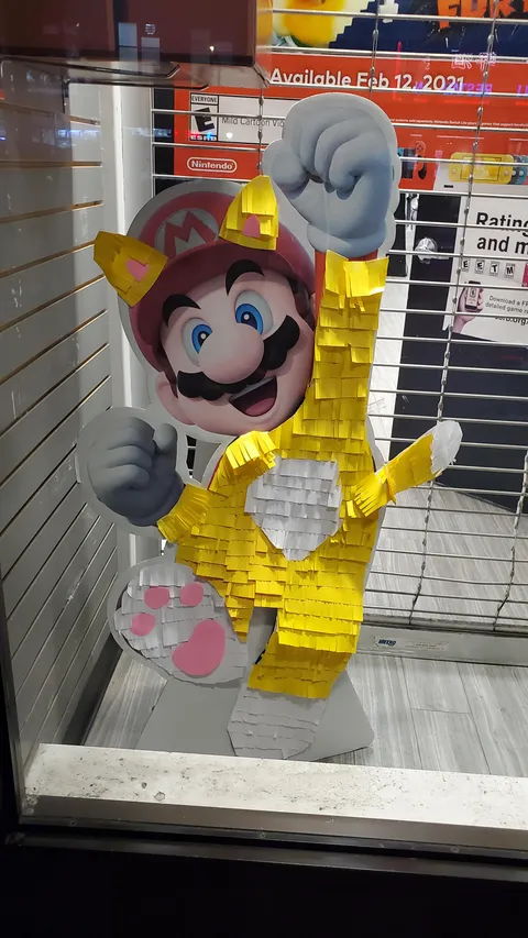 My local Gamestop does not have a Super Mario 3D World standee. They had an old Mario standee and a lot of sticky notes.