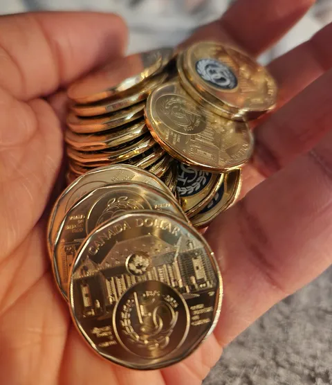 I went to the bank to get change for laundry and received a roll of brand new special loonies