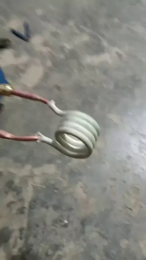 A changing magnetic field induces eddy currents in the metal, thereby generating heat