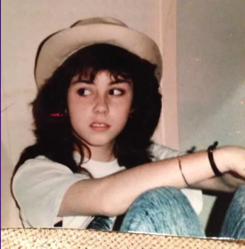My mom in 1989 @ 15, 2 years before I was born. She's still making the same face. 
