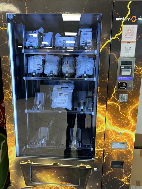 This train station has a mystery vending machine where you can buy whatever is in the unclaimed packages from delivery lockers 