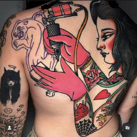 Trad tattoo of a tattoo artist tattooing a “sick ass panther” tattooception. @elmundodeltradi on insta São Paulo, Brazil