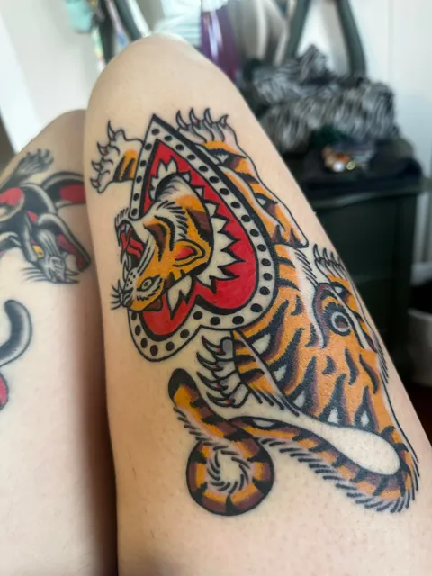 My thigh kitties! One fresh, one healed - done by Felipe Miranda in Portland OR