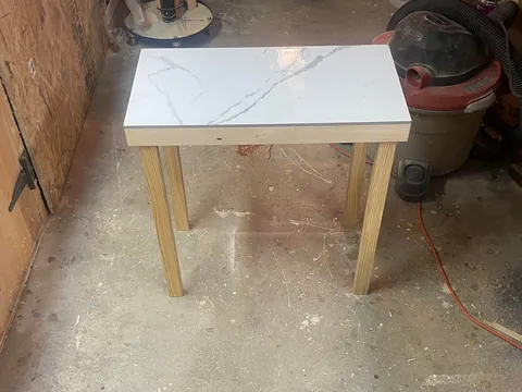 I made my self a night stand table with a tile from lowes and some scrap wood out pallets