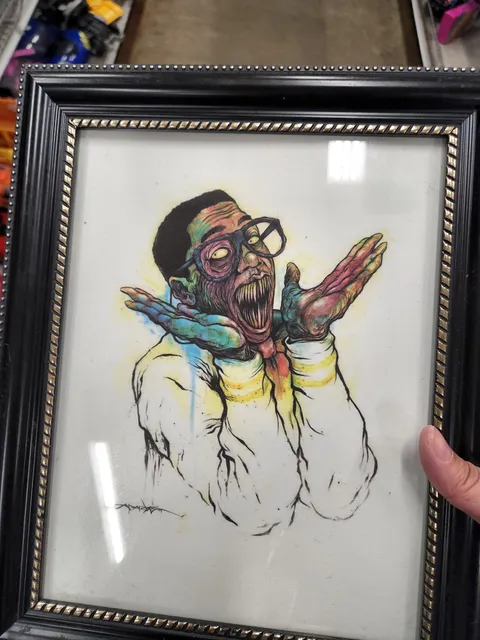 Since everyone seemed to like that creepy doll donation so much here was the second creepiest weird thing I ever found in a shelf full of paintings.