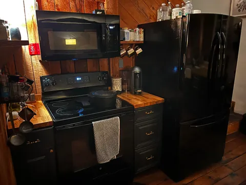 My downstairs living room, kitchen, entry way, music room and bathroom