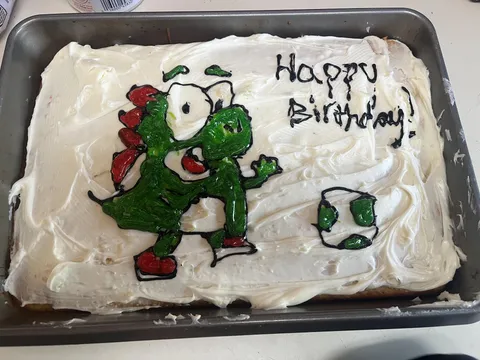 For the past 9 years I’ve been posting the terrible Yoshi Cakes my wife has made me for my birthday.