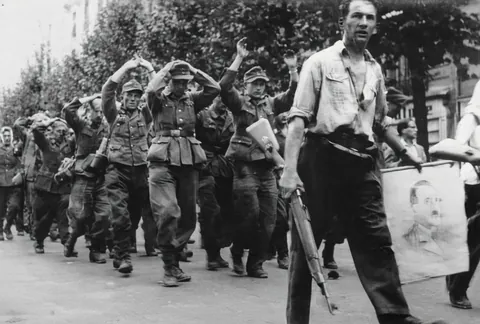 "Nazi following their leaders" German PoW's escorted by French irregulars during the liberation of France (1944)