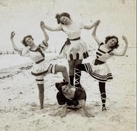Some photos of people smiling and having fun during the Victorian Era (late 1800s)