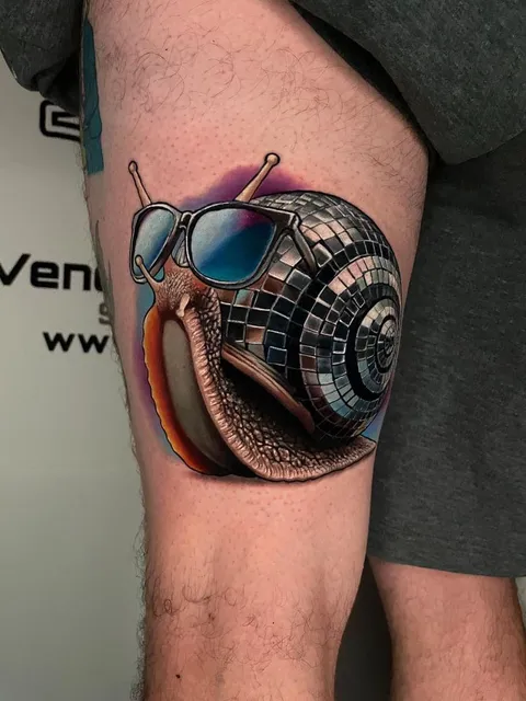 Disco Snail by Teresa Andrews at Venom Ink in Sanford, ME