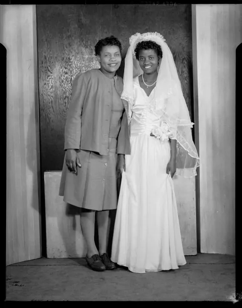 Young couple at their wedding (a war wedding) circa 1940s.