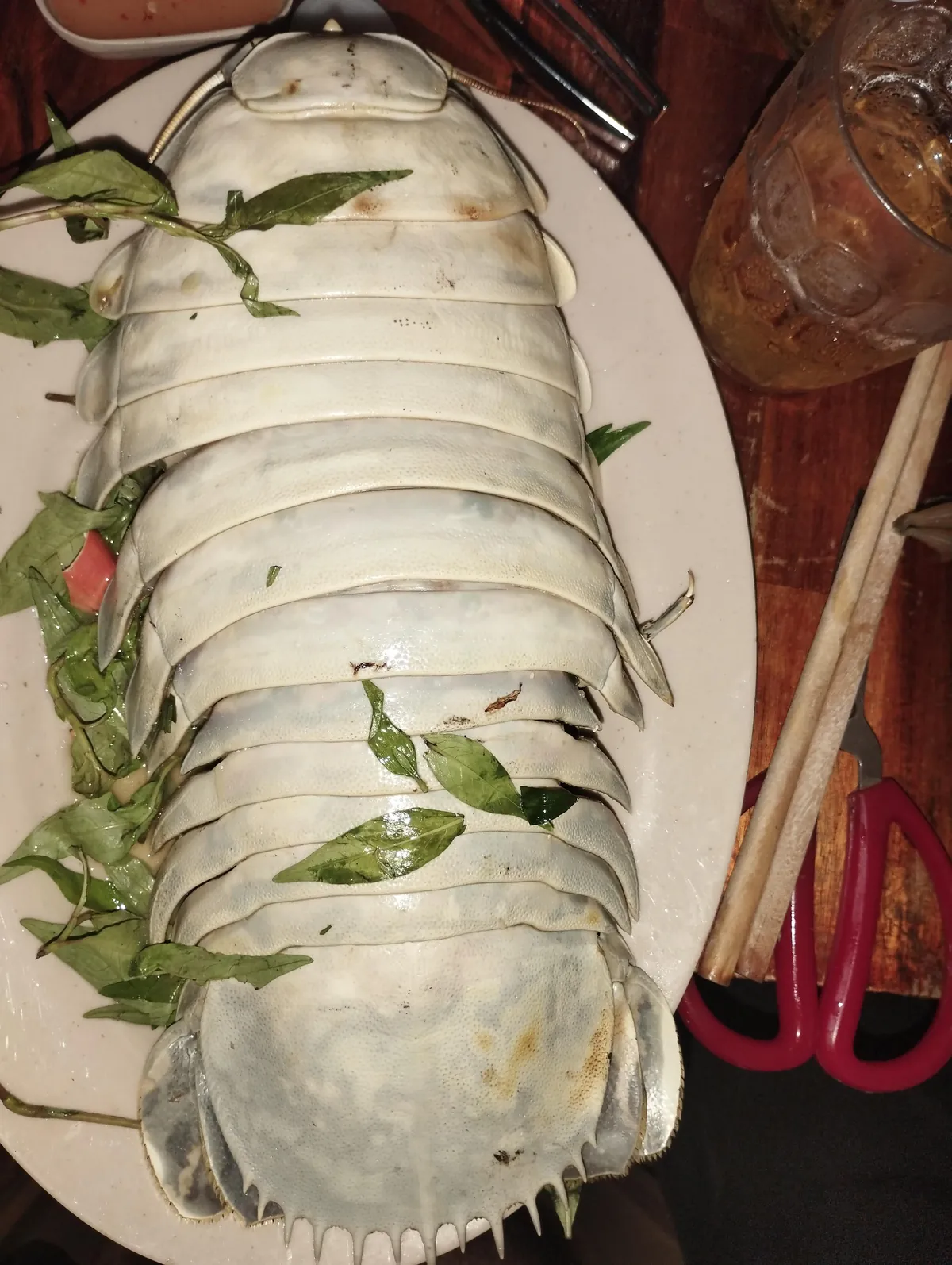 [I ate] Bathynomus giganteus with fried and spring onions.