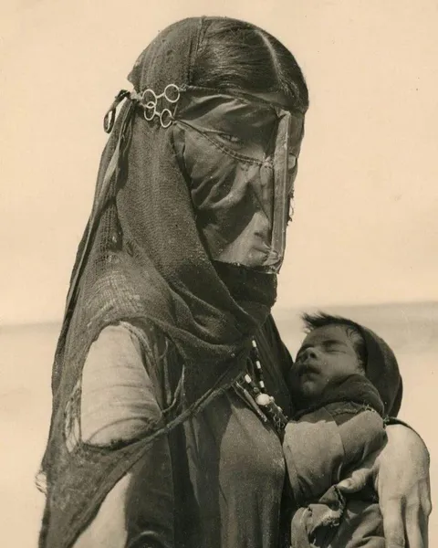 Bedouin mother, Saudi Arabia, 1948. Photograph by Ilo Battigelli.