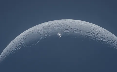 One of the most difficult shots I've ever attempted, this is the moment the ISS transited the waxing crescent moon in broad daylight. Uncropped photo and video of the event linked in the comments.