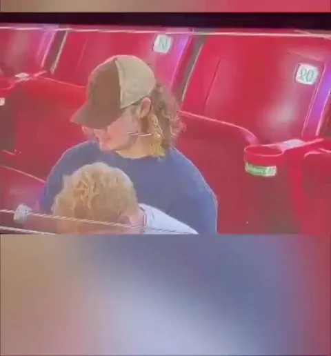 This structural pole is inches from the lens nearly blocking the entire view but when zoomed in it appears the camera can see through the pole