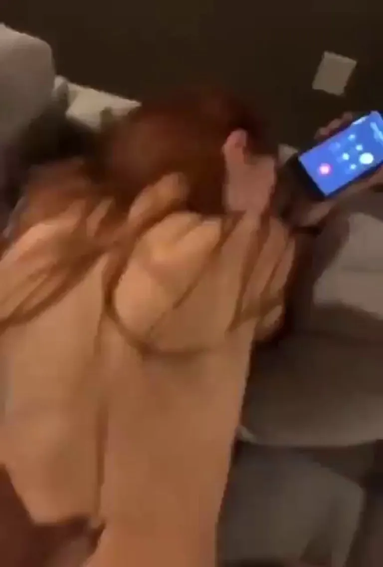 one the phone while getting backshots