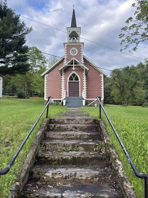 Old Church(1892) with upside-down cross above the door.