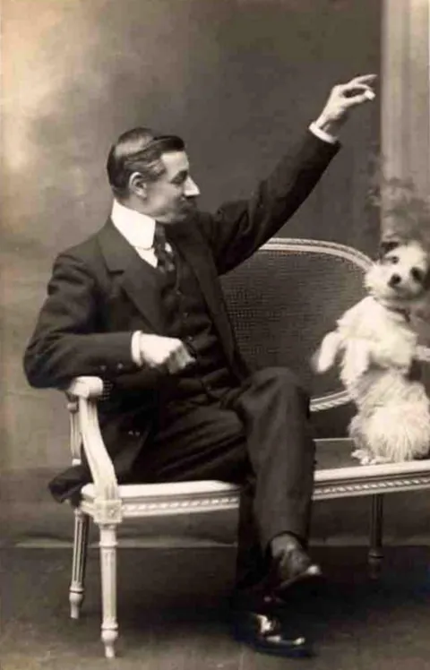 Gentleman pose for photos with their beloved pups, circa 1880-1900