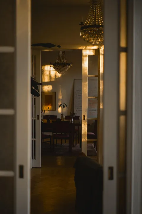 Cozy afternoon lighting shining through hand blown windows