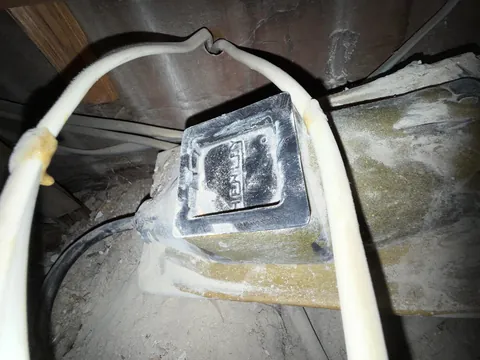 What is this ceramic submarine looking thing under my floorboards?