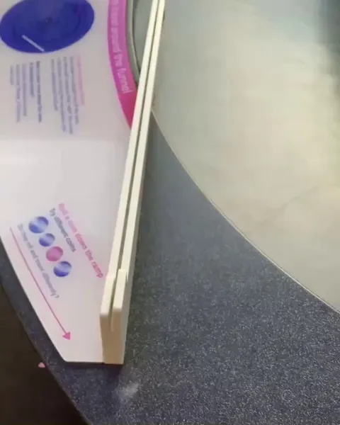 Coin rolling down a large funnel