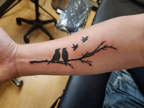 Memorial piece our twin girls we lost. Done by Sydney at Duluth Tattoo Co