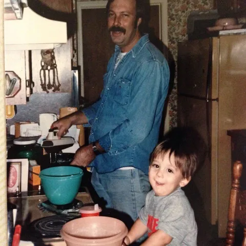 Dad teaching me how to make cornbread. Houston, TX, 1986