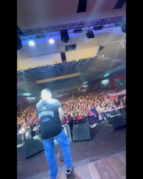 Singer Dancing on a Show