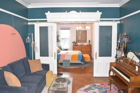 It took a year, but the living room, office, bedroom, and bathroom are all done.