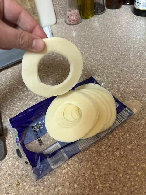 My newly opened package of provolone cheese is missing the centers.