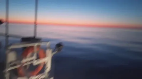 The line that separates day and night is called the terminator and also the "twilight zone. Here you can say night and day together, on the left it's still day (the sun is still shining) and on the right it's already a dark night with the moon.