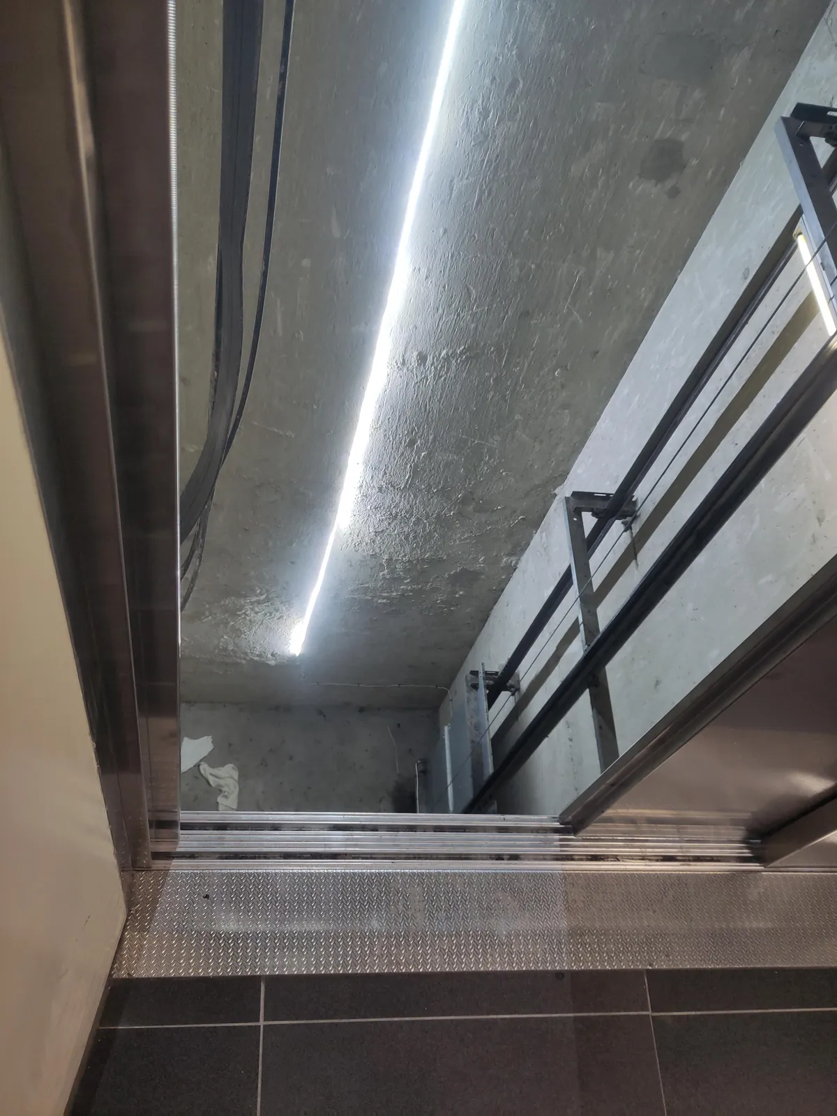 Elevator at work opened up without an elevator.