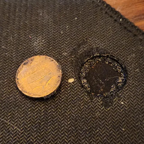A penny seems to have melted my mouse pad